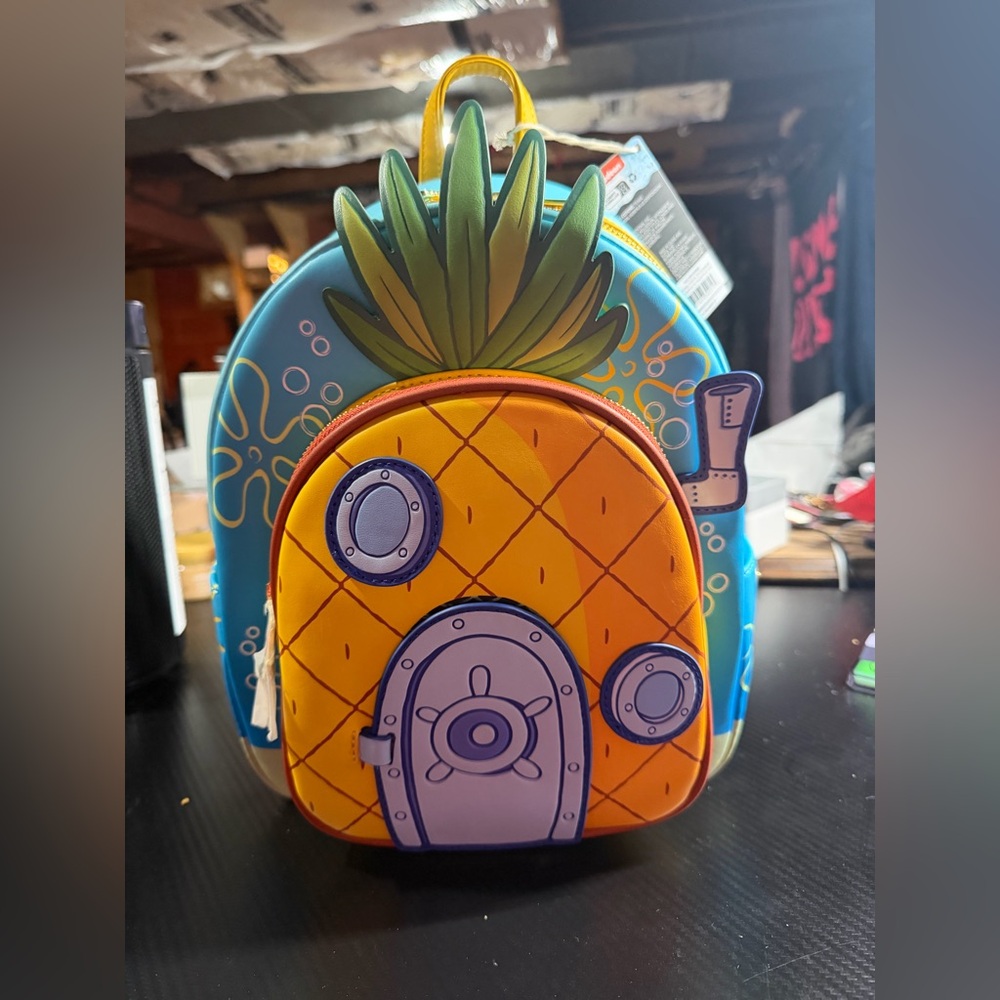 Loungefly Spongebob Pineapple Mini Backpack in Ye… - image 1